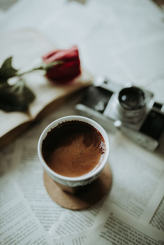 Slow Blogging Is Back as Readers Tire of the Feed A cup of coffee beside a window in quiet morning light